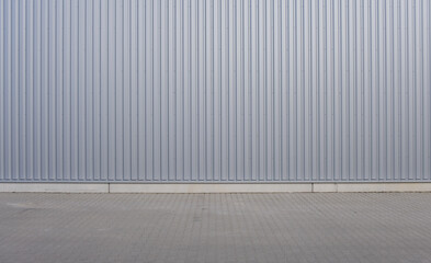 corrugated iron sheet, aluminum Facade of a warehouse as background texture