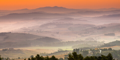 Tuscany orange foggy landscape scene