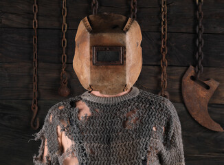 halloween man in old welding mask