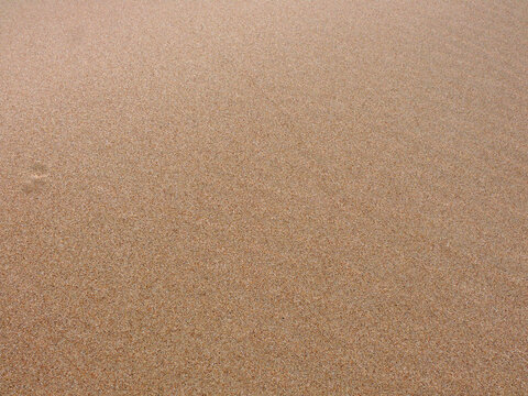 Vue de sable fin avec trace de pied