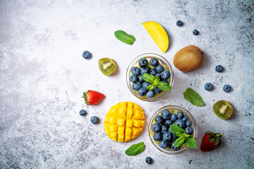 Rainbow fruit salad in a glass