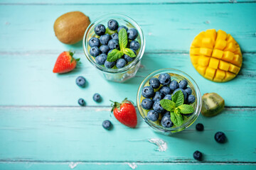 Rainbow fruit salad in a glass