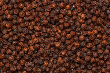 Close up of red pepper or peppercorns as background.