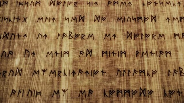 An ancient wooden tablet, full of carved runes (runic signs). Movement from 2D to 3D, detail to entire content. The text is fake, as it's the latin (public domain) Lorem Ipsum.
