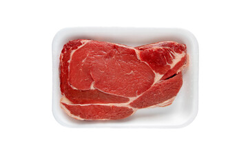 Meat slice in the plastic foam tray isolated on white top view