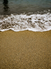 waves on the sand