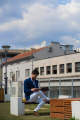 Fototapeta premium Sitting and working outdoor