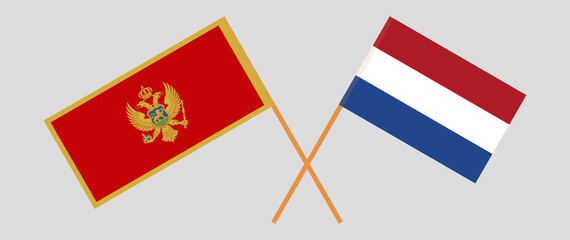 Crossed flags of Montenegro and the Netherlands. Official colors. Correct proportion