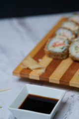 Sushi Rolls on the board beautiful view
