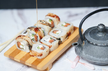 Sushi Rolls on the board beautiful view
