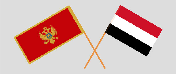 Crossed flags of Montenegro and Yemen. Official colors. Correct proportion