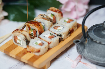 Sushi Rolls on the board beautiful view
