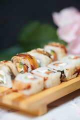 Sushi Rolls on the board beautiful view
