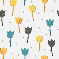 Floral seamless pattern with yellow and blue tulips. 
