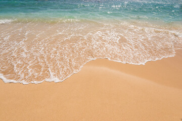 Beautiful beach and tropical sea. Sand and water vacation background.
