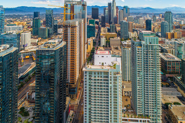 Naklejka premium Aerial Shot of Downtown Los Angeles California. Beautiful stunning views of Downtown High Rise buildings and Rooftop Helipads. Beautiful Sunny day.