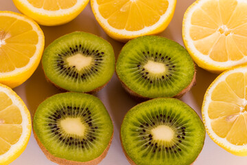 Obraz na płótnie Canvas kiwi and lemon, fruit in cross section