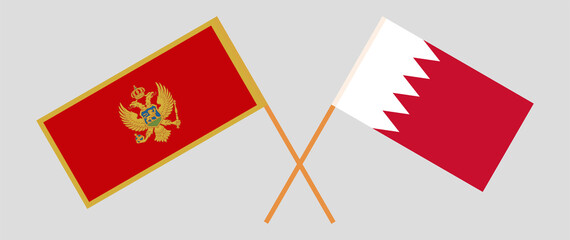Crossed flags of Montenegro and Bahrain. Official colors. Correct proportion
