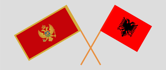 Crossed flags of Montenegro and Albania. Official colors. Correct proportion