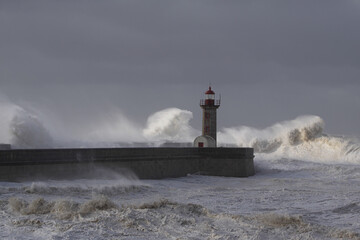 Fototapeta na wymiar Sea storm at the river mouth