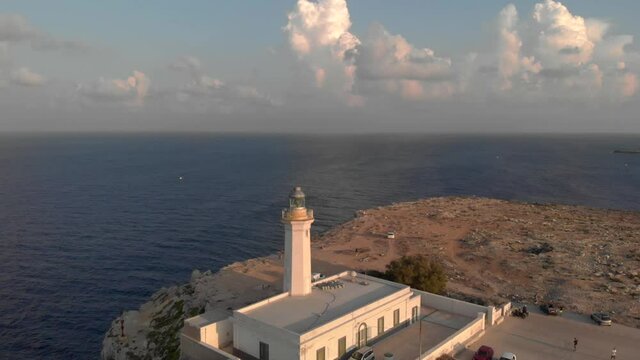 Aerial shot Lampedusa Island (Drone 4k), seagulls, isola dei conigli at sunset - concept of paradise on earth, happiness and travel to beautiful places