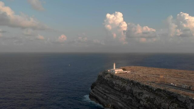 Aerial shot Lampedusa Island (Drone 4k), seagulls, isola dei conigli at sunset - concept of paradise on earth, happiness and travel to beautiful places
