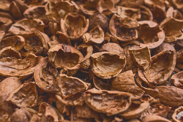 Walnut shell brown background, peeled walnut texture