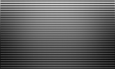 Abstract grey metal scratched plate with holes background	