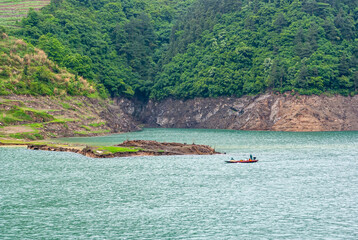 Yangtze River, Three Gorges, China - May 6, 2010: Xiangxicun region in Xiling Gorge. Small...
