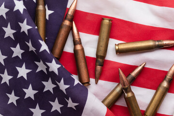 Bullet ammunition on a United states stars and stripes flag