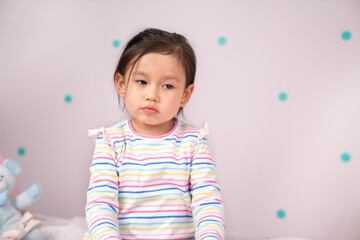 Little girl looking sad..