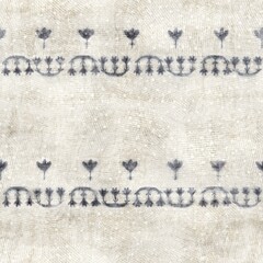 Seamless grungy tribal ethnic rug motif pattern. High quality illustration. Distressed old looking native style design in shades of gray and cream. Old artisan textile seamless pattern.