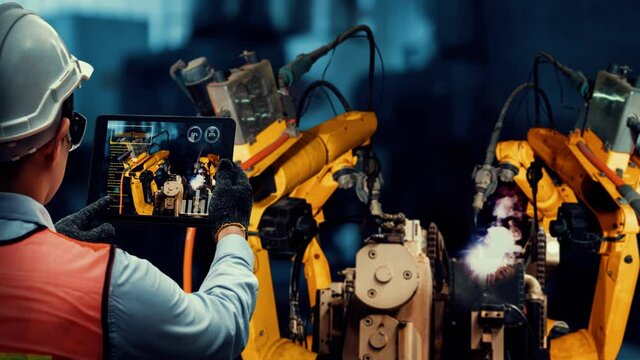 Smart industry robot arms modernization for innovative factory technology . Concept of automation manufacturing process of Industry 4.0 or 4th industrial revolution and IOT software control operation.