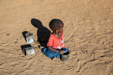 African kid playing