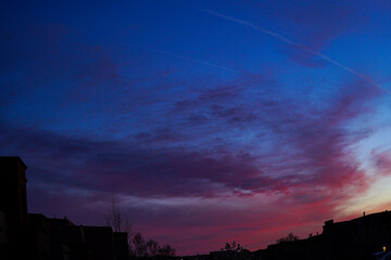 time clouds over city