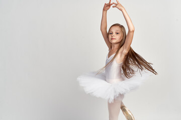 Cute little girl ballerina dance performed studio - obrazy, fototapety, plakaty