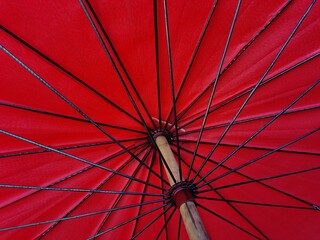 red umbrella on a black background