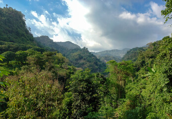 Fototapeta na wymiar Expansive wide shot of forested hills and mountains in northern Luzon, Philippines