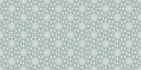 Obraz premium Abstract Christmas background pattern with snowflakes, wallpaper. Seamless pattern, texture for your design. Vector illustration 