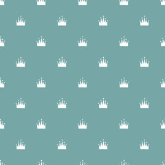 Seamless pattern with hand drawn hearts and crowns on blue background. Vector repeating doodle elements