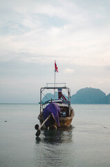 Obraz premium fishing boat on the beach