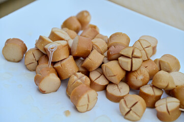 Closeup of Thai people celebrate Songkran Day with savory dishes and desserts reception in Songkran festival or Thai new year in Thailand. 