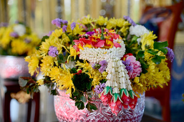 Thai traditional flower garland on fresh flowers for blessing ceremony of adults in Songkran festival or Thai new year in Thailand. 