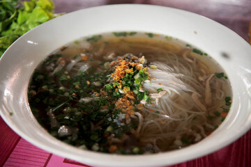 Khao Piak Sen (Lao- style chicken noodle soup). 