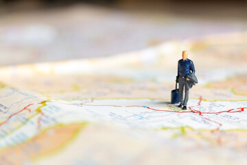 Miniature Business people standing on map , Travel concept
