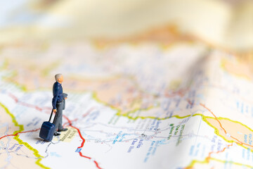 Miniature Business people standing on map , Travel concept