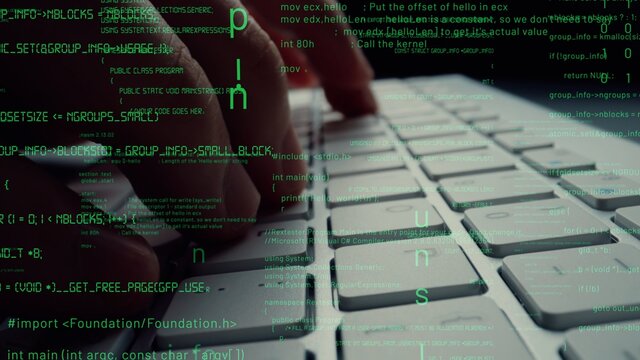 Creative visual of computer programming coding and software development shown by man working on computer keyboard with overlay of computer graphic displaying abstract program codes and computer script