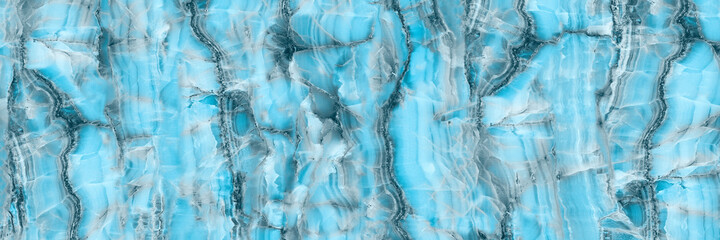 Obraz na płótnie Canvas Blue onyx marble texture, abstract background. Luxurious Aqua Tone onyx marble with golden veins high resolution, Turquoise Green marble, polished slice mineral, blue water in swimming pool rippled.