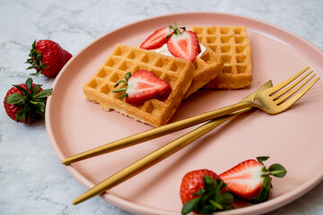 waffles with strawberries and cream