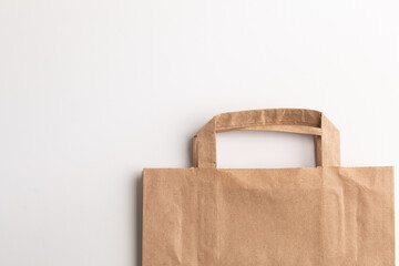 An eco-friendly paper bag for groceries. Paper package for purchases biodegradable. Secondary raw...